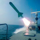 An IRGC speedboat launching missiles during live-fire exercises in a photo released on July 28, 2020. This photo was released by the IRGC and cannot be independently verified